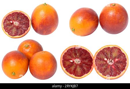 Three ripe red oranges on a white isolated background Stock Photo