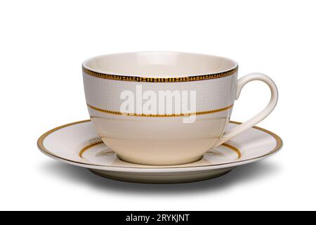 Beautiful empty ceramic coffee cup with saucer isolated on white background. Stock Photo