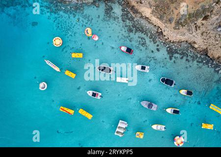 Aerial drone photograph of watersport boats moored anchored at the sea Stock Photo