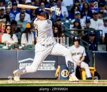 Milwaukee, United States. 01st Oct, 2023. Milwaukee Brewers center fielder Garrett  Mitchell hits a RBI sacrifice fly ball against the Chicago Cubs in the  first inning of their baseball game at American