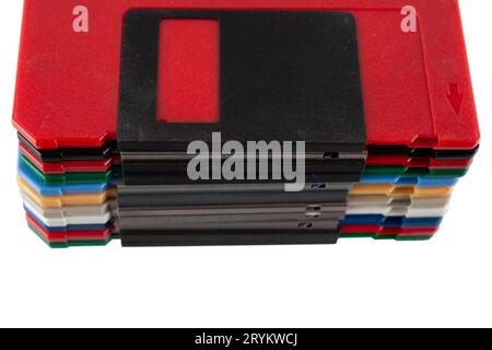 Colored old retro floppy diskettes in stack. Isolated on white background. Stock Photo
