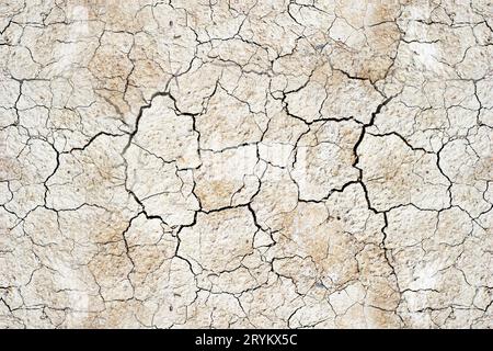 Dry cracked earth texture, global climate warming. Stock Photo