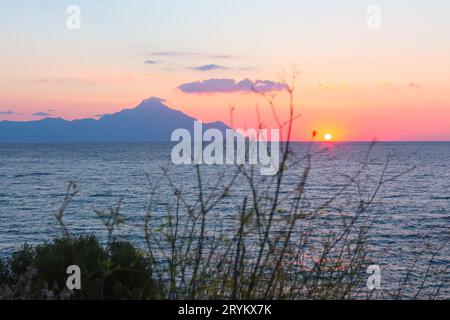 Silhouette of mount Athos at sunrise, Greece Stock Photo