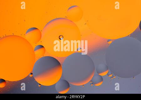 Abstract orange gray background with oil circles water surface Stock Photo