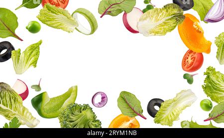 Fresh salad leaves, mix of cut vegetables, frame of healthy food ingredients Stock Photo