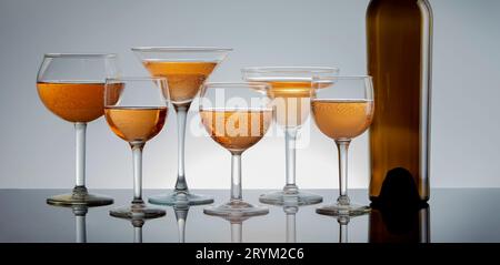 Filled wine glasses panorama. Stock Photo