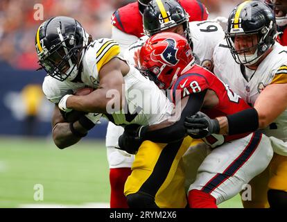 Houston, Texas, USA. October 1, 2023: Steelers running back Najee Harris (22) is tackled on a carry during an NFL game between the Houston Texans and the Pittsburgh Steelers on October 1, 2023 in Houston. (Credit Image: © Scott Coleman/ZUMA Press Wire) EDITORIAL USAGE ONLY! Not for Commercial USAGE! Credit: ZUMA Press, Inc./Alamy Live News Stock Photo