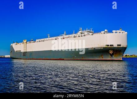 Vehicle carrier Höegh Trooper leaves the Port of Mobile, Sept. 30, 2023, in Mobile, Alabama. The ship is part of the Höegh Autoliners fleet. Stock Photo