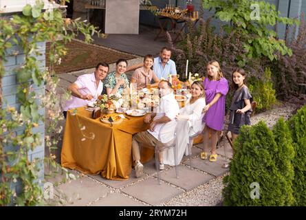 Many people saying cheers and showing their champagne glasses. Wedding party Stock Photo