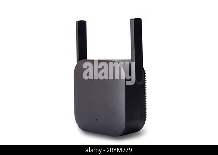Black plastic box of wireless wi-fi signal range extender on white background. Stock Photo