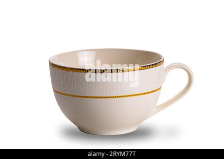Empty brown ceramic coffee cup with golden pattern decorated edge isolated on white background. Stock Photo