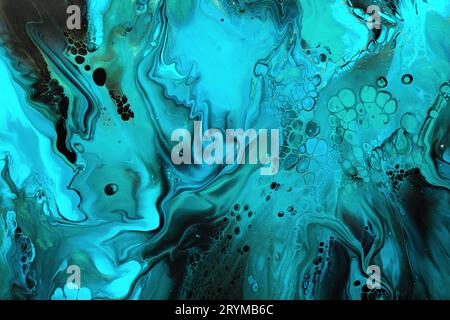 Fluid Art. Green and blue abstract wave swirls on black background. Marble effect background or texture Stock Photo