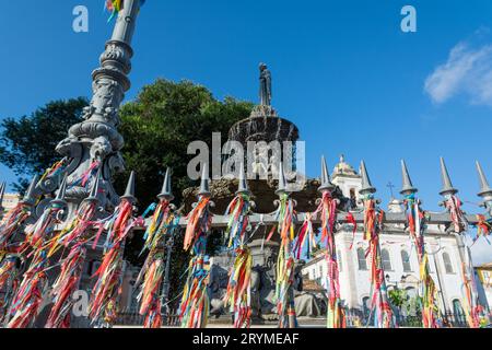 Salvador, Bahia, Brazil - September 02, 2023: View of hundreds of souvenir ribbons tied to an iron railing in Largo Terreiro de Jesus, Pelourinho, his Stock Photo