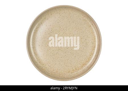 Top view of single empty round spotted brown ceramic plate isolated on white background. Stock Photo