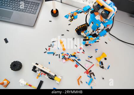 Various components and installations for robot fabrication fill the space, representing the intricate blend of technology, engin Stock Photo