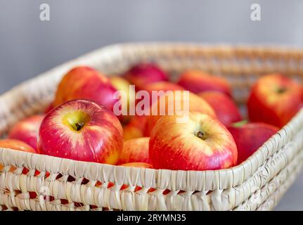 Organic fresh juicy apples in the basket, healthy eating concept Stock Photo