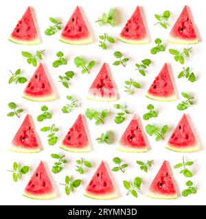 Juicy watermelon slices and mint leaves arranged in a pattern isolated on white background, top view Stock Photo