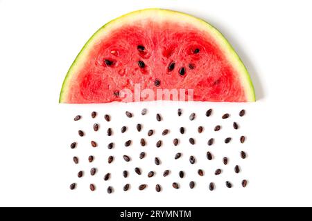 Slice of watermelon and seeds, top view isolated on white background Stock Photo