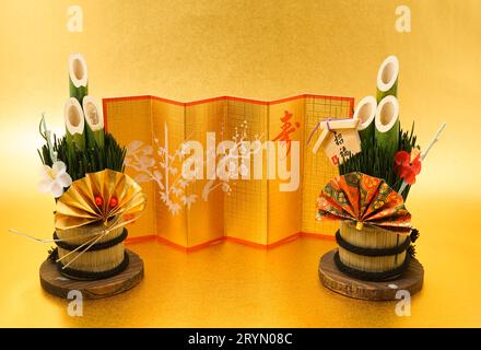 Kadomatsu and gold folding screen of the image (New Years card materials and New Year material) Stock Photo