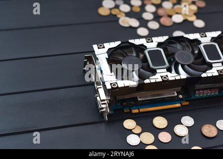 Cryptocurrency mining concept with bitcoins on a computer videocard Stock Photo