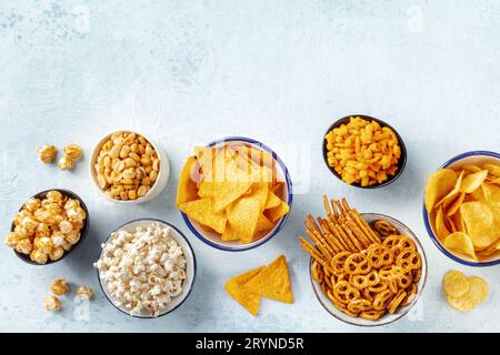 Happy birthday. Text from the salty crackers as printed English letters  that lie on a wooden chopping board. Message, lined with edible letters  Stock Photo - Alamy