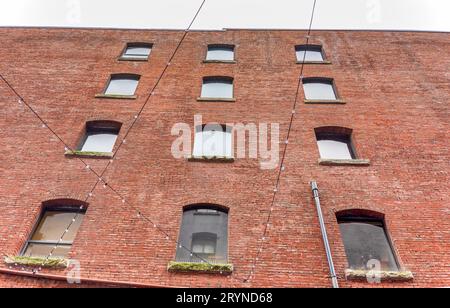 Brick wall of histrical office building in downtown of Vancouver Stock Photo