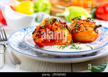 Stuffed red peppers with herbs. Stock Photo