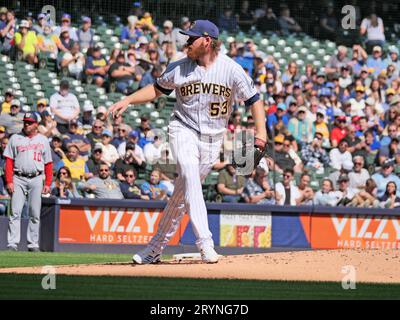Milwaukee Brewers pitcher Brandon Woodruff celebrates with teammates ...