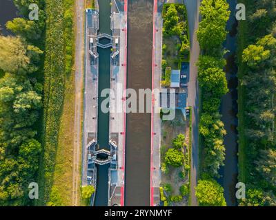 DUFFEL, LIER, BELGIUM, May 31, 2023, Aerial view or top down view of the River lock between Nete Channel and Nete River, showing Stock Photo