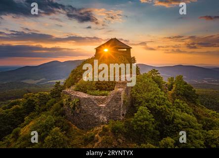 Salgotarjan, Hungary - Aerial view of the ruins of Salgo Castle (Salgo vara) in Nograd county with sunlight through it's window and beautiful dramatic Stock Photo