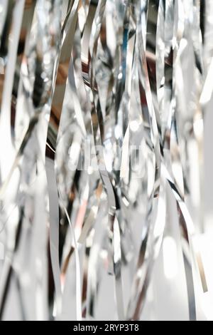 Abstract atmospheric background of tinsel with bokeh. Stock Photo