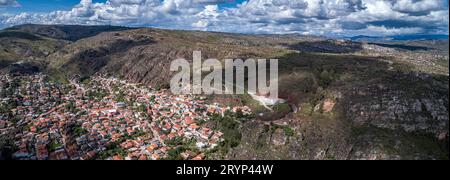 Panoramic aerial view with sunshine, shadow, dramatic sky of the north-east part of historic town Di Stock Photo