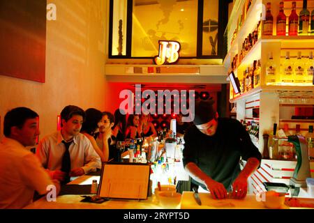 People at a bar in the trendy area of Palermo Viejo known as Soho. Stock Photo