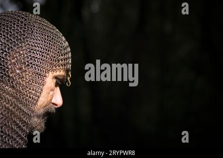 Portrait of man dressed as medieval warrior. Stock Photo
