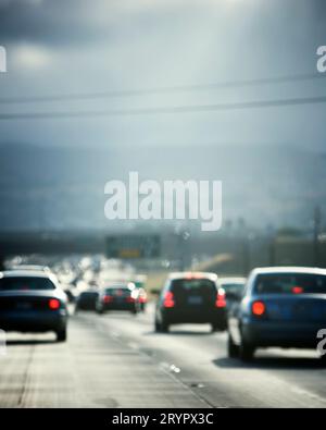 Interstate Traffic In The Rear View Mirror Stock Photo - Alamy