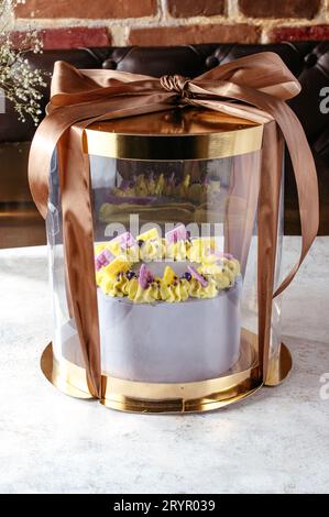 birthday cake in a transparent package with a bow Stock Photo