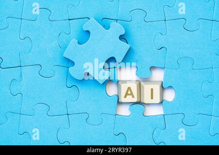 Blue puzzle and computer keyboard keys with AI word Stock Photo