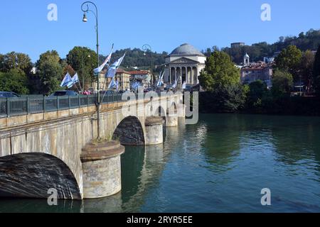 Turin, Piedmont, Italy. 09-29-2023 The Po river that flows in the city with Gran Madre di Dio church on background. Stock Photo