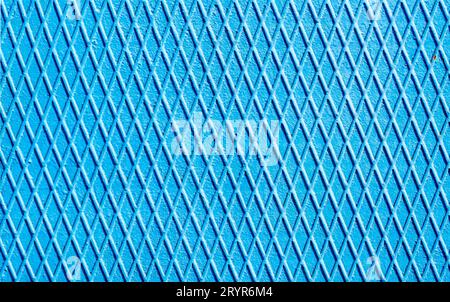 Blue iron wall with intersecting lines close up Stock Photo