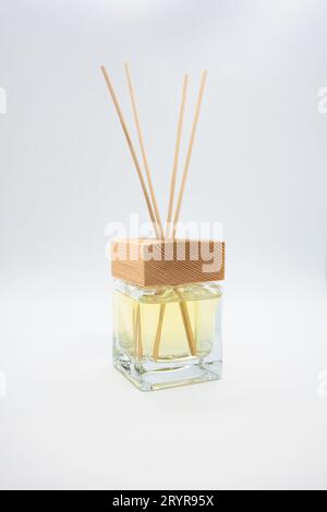 A Bottle of Lavender Fragrant Oil Diffuser with Reed Sticks, isolated on white background Stock Photo