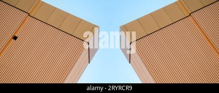 Orange wall of a modern building Stock Photo