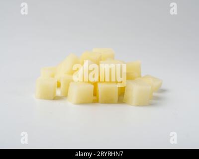 Heap of diced raw potatoes isolated on white Stock Photo