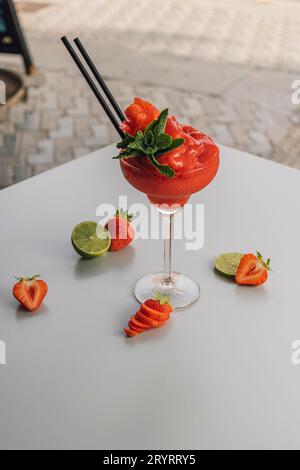 Strawberry Daiquiri Cocktail decorated with lime and strawberry fruit Stock Photo