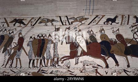 Intendant Wadard (on horseback) and troops of William the Conqueror.  - Bayeux Tapestry, known as the Queen Matilda Embroidery, 1077 Bayeux Library Stock Photo