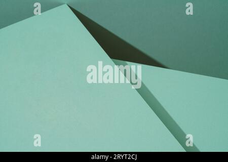 Colorful background from green paper with shadow. Abstract geometric Stock Photo