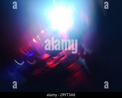 Bright colorful stage lights blur backdrop. Stage lights on concert. Stock Photo