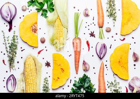 Creative background made with Autumn seasonal vegetables, herbs and spices Stock Photo