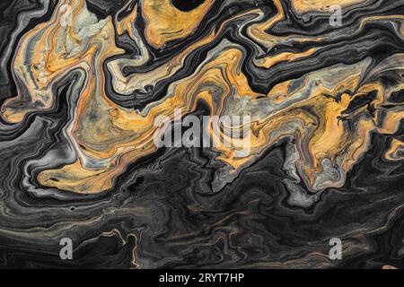 Acrylic Fluid Art. Golden and black wave pattern. Luxury Marbleized effect Stock Photo