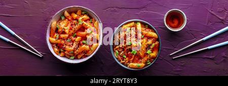 Tteokbokki or topokki and rabokki, Korean street food, spicy rice cakes Stock Photo