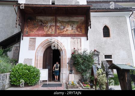 Late Gothic frescos and south portal from XV century in Late Gothic Katholische Pfarrkirche Maria Himmelfahrt (Maria am Berg) (Catholic Parish Church Stock Photo